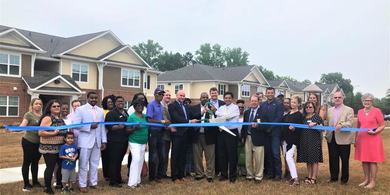 Griffin Park Offers 72 Affordable Apartment Homes for Lumberton Families Group of people cutting a ribbon